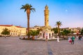 Izmir clock tower at sunset with visitors in konak square, turkey. August 4, 2025, Izmir Turkey Royalty Free Stock Photo
