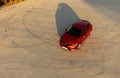 Red Renault Clio 5: Aerial View with Sunset Drift Marks