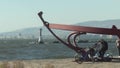 Izmir, Turkey - August 15, 2020: Konak steam boat pier and Bihrat Mavitan's sculpture.