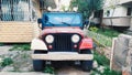 Izmir, Turkey - Dec 23, 2022: Red motor car Jeep CJ-7 in the city street Royalty Free Stock Photo