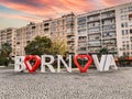 Izmir, Turkey - July 7, 2022 : Republic Square of Bornova District view in Izmir City. Redcolor city name statue of Bornova/Izmir