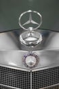 Close up shot of a Mercedes 220S blue car`s 3d logo and grid which produced in 1958. Editorial Shot in Izmir Turkey