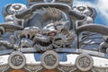 Detail of colored eye clay dragon gargoyle roof ornament at Shuzenji Temple