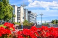 Izvestia building and red flowers, Novopushkinsky Square, Moscow