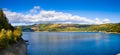 Izvorul Muntelui lake with autumn scenery and beautiful blue sky Royalty Free Stock Photo