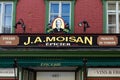 The J.A. Moisan sign over the landmark grocery store located at 685 Saint-Jean Street Royalty Free Stock Photo