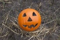 Jack lantern for Halloween of a basketball on scorched earth