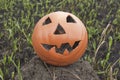 Jack lantern for Halloween of a basketball on scorched earth