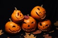 Jack lantern pumpkins for Halloween decoration and maple leaves with acorns Royalty Free Stock Photo