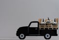 Jack O` Lantern Halloween hayride on black wooden toy truck