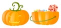 Jack-o-lantern and pumpkin bucket full of candy Royalty Free Stock Photo