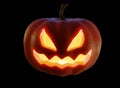 Jack-o-lantern pumpkin with orange light isolated on black. Clipping path.