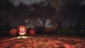 Jack-o-lantern pumpkin in spooky forest at dusk Royalty Free Stock Photo