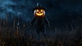 Jack-o\'-lantern Scarecrow in a Field at Night Royalty Free Stock Photo