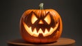 Jack o lantern sitting on the wodden table with dark background