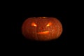 Jack o lanterns Halloween pumpkin face isolated on black Royalty Free Stock Photo