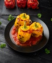 Jack o lanterns stuffed yellow pepper for Halloween. Royalty Free Stock Photo