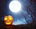 Jack O'Lantern under the full moon Royalty Free Stock Photo