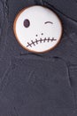 Jack Skellington cookie on black background.