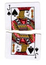A jack of spades playing card torn in half.