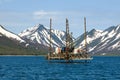 Jack up drilling rig on production platform Royalty Free Stock Photo