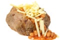 Jacket potato filled with baked beans and grated cheese Royalty Free Stock Photo