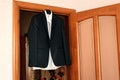 Jacket, tie and shirt hanging Royalty Free Stock Photo