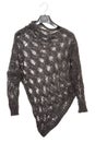 Jacket is on white, female black sweater, asymmetrical jumper,