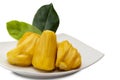 Jackfruit ripe yellow fruit flesh in white plate with green leaf