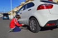 Jacking A Car Up To Change The Wheel Royalty Free Stock Photo