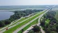 Jackson County Rest Area West rest area with Pascagoula River bridge, large parking lots semi-trucks, cargo trailers along Royalty Free Stock Photo