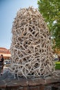 JACKSON HOLE, WY - JULY 12, 2019: Famous Antler Arch at Jackson Town Square, with Cowboy Bar Royalty Free Stock Photo