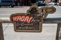 Sign with a wild west gun and cowboy theme - Whoa Partner, use Crosswalk Down Yonder, preventing