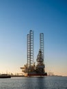 Jackup drilling rig hooked up to shore-to-ship power at Doggerkaj at Esbjerg harbor, Jutland, Denmark