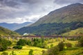 Jacobite steam train on Glenfinnan viaduct in Scotland, United Kingdom Royalty Free Stock Photo