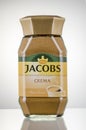 Jacobs Kronung coffee isolated on gradient background.