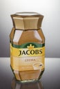 Jacobs Kronung coffee isolated on gradient background.