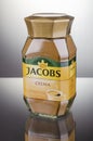 Jacobs Kronung coffee isolated on gradient background.