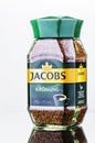 Jacobs Kronung coffee isolated on gradient background.