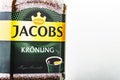 Jacobs Kronung coffee isolated on gradient background.