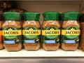 Jacobs Monarch decaff freeze dried granulated instant coffee, row of coffee glass jars in a supermarket shelf close up, Russia,