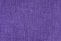 Jacquard woven upholstery, bright purple coarse fabric texture close up