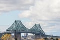 Pont Jacques Cartier bridge taken in Longueuil in the direction of Montreal, in Quebec, Canada, during a cloudy afternoon.