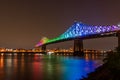 Jacques Cartier Bridge in a rainbow lighting at night. Montreal Royalty Free Stock Photo
