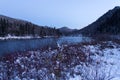 The Jacques-Cartier river flowing through the Jacques-Cartier National Park valley seen during a late Fall blue hour Royalty Free Stock Photo