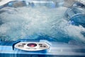In the jacuzzi is gaining water close up, relaxing in the spa. Royalty Free Stock Photo