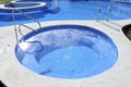 Jacuzzi outdoor blue swimming pool Royalty Free Stock Photo