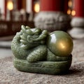 Jade dragon sculpture in an oriental setting. Royalty Free Stock Photo
