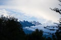 Jade Dragon Snow mountain with clouds near Lijiang in Yunnan province Royalty Free Stock Photo