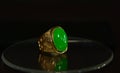 Jade is a gold ring decorated with green jade. beautiful